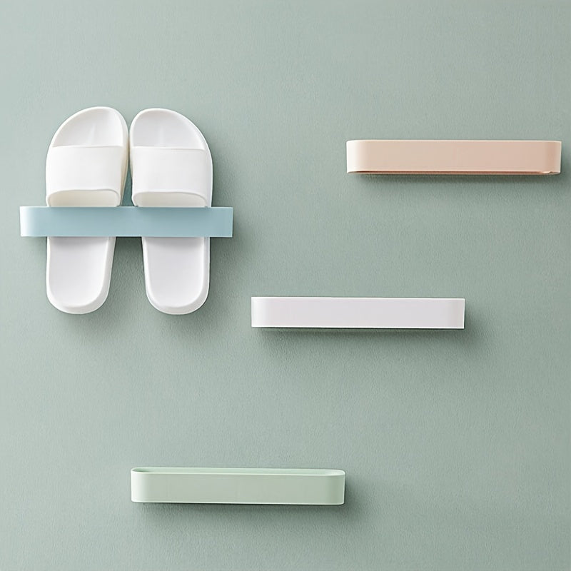 Organize your shoes with ease using our convenient Wall-Mounted Plastic Shoe Rack Organizer. This space-saving adhesive shoe storage shelf is perfect for storing slippers, sandals, and shoes without the need for drilling. Easy to install, it is ideal for