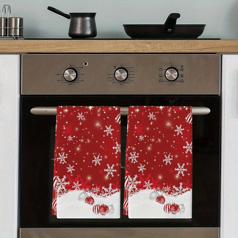 A set of 2 contemporary Christmas kitchen towels, each measuring 45.72x66.04 cm. Made from soft polyester material, featuring a fun cartoon theme. These rectangular towels are machine washable and quick drying. They are adorned with a festive Merry