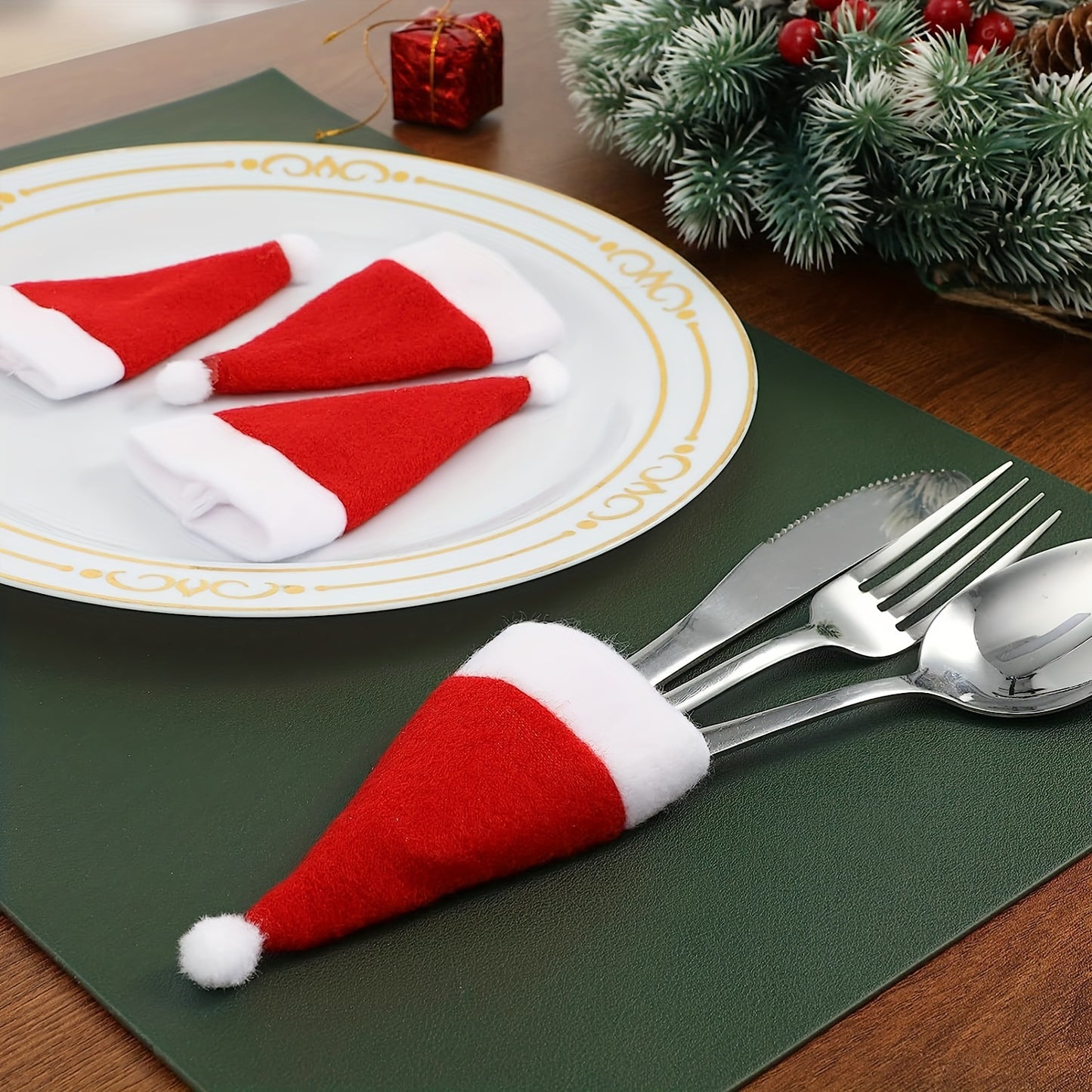 Festive Christmas 10-Pack Santa Hat Silverware Holders for Holiday Dining and Seasonal Decor.