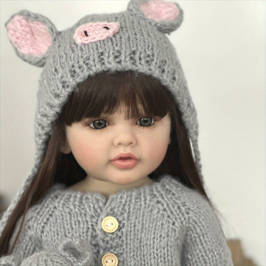 22 inch full vinyl body reborn girl doll with long hair, realistic princess design, and plush toy.