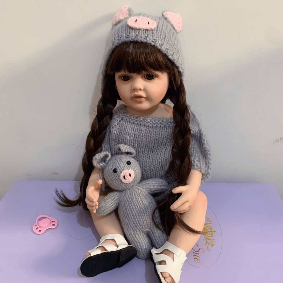 22 inch full vinyl body reborn girl doll with long hair, realistic princess design, and plush toy.