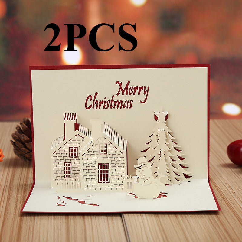 Get into the holiday spirit with this 3D Pop-Up Christmas Card featuring a festive castle and tree design. Made of hollow-out plastic, this unique greeting card is the perfect decoration for the holiday season and New Year's celebration.