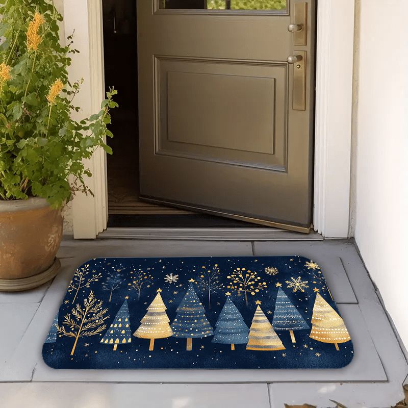 Give the gift of holiday cheer with this festive Polyester Christmas Doormat! Featuring geometric trees with golden accents on a navy blue background, this machine washable carpet is the perfect addition to any home decor. Complete with a snowflakes