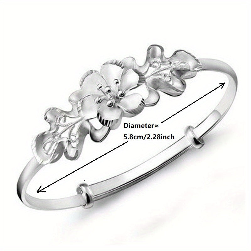 Sterling Silver Flower Bracelet made from S999 silver, features an adjustable design that is both fashionable and versatile. This noble fashion bracelet is a perfect gift for lovers, mothers, daughters, and as party, Valentine's Day, or Christmas gifts.