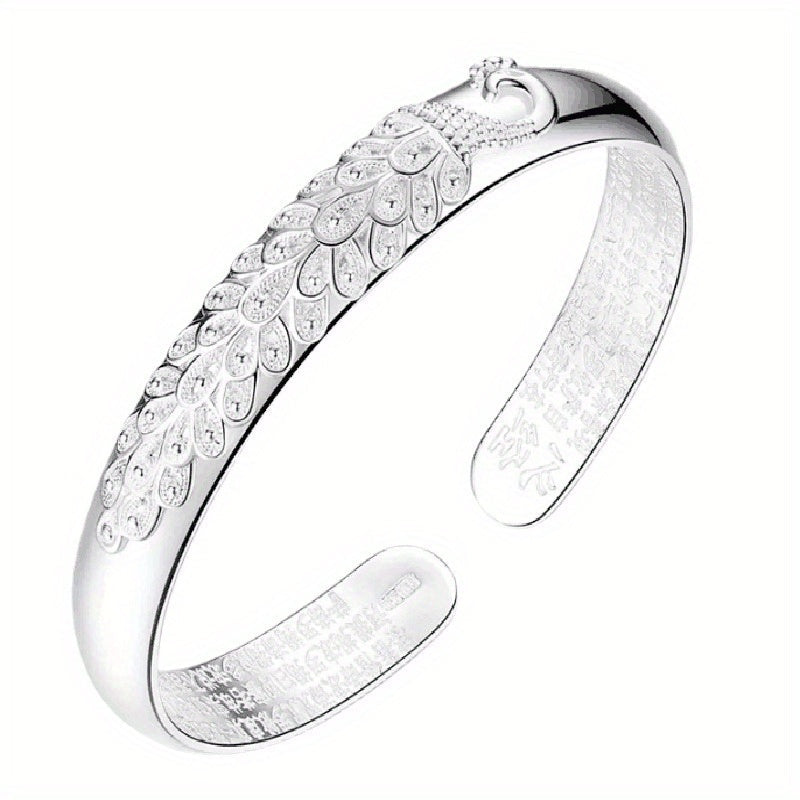 This elegant and versatile S999 sterling silver open bracelet is adjustable, fashionable, and simple in style. It is the perfect gift for your loved ones, including lovers, mothers, daughters, and for special occasions like parties, Valentine's Day, or