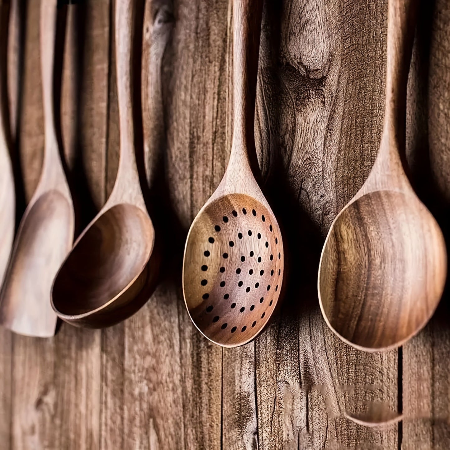 Set of 5 wooden kitchen utensils made from natural wood, ideal for use with non-stick pots, dishes, and kitchen supplies.