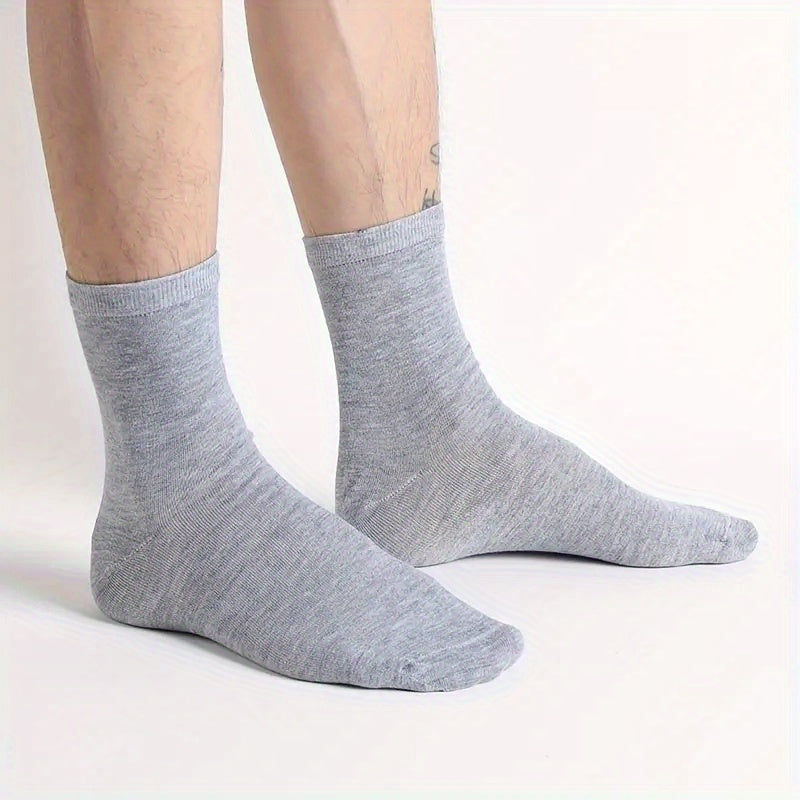 10 breathable crew socks in solid colors made from a polyester blend, ideal for sports and casual wear during spring.