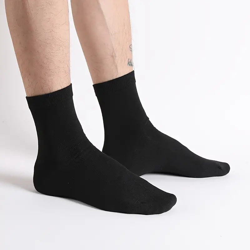 10 breathable crew socks in solid colors made from a polyester blend, ideal for sports and casual wear during spring.