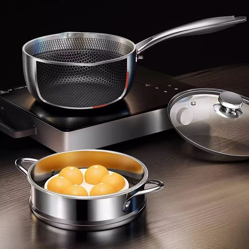 This saucepan is made of durable 316 stainless steel and features a honeycomb non-stick surface, making it perfect for cooking a variety of dishes like baby food, soup, stew, and fried noodles. It also comes with a lid and measuring ladle for added