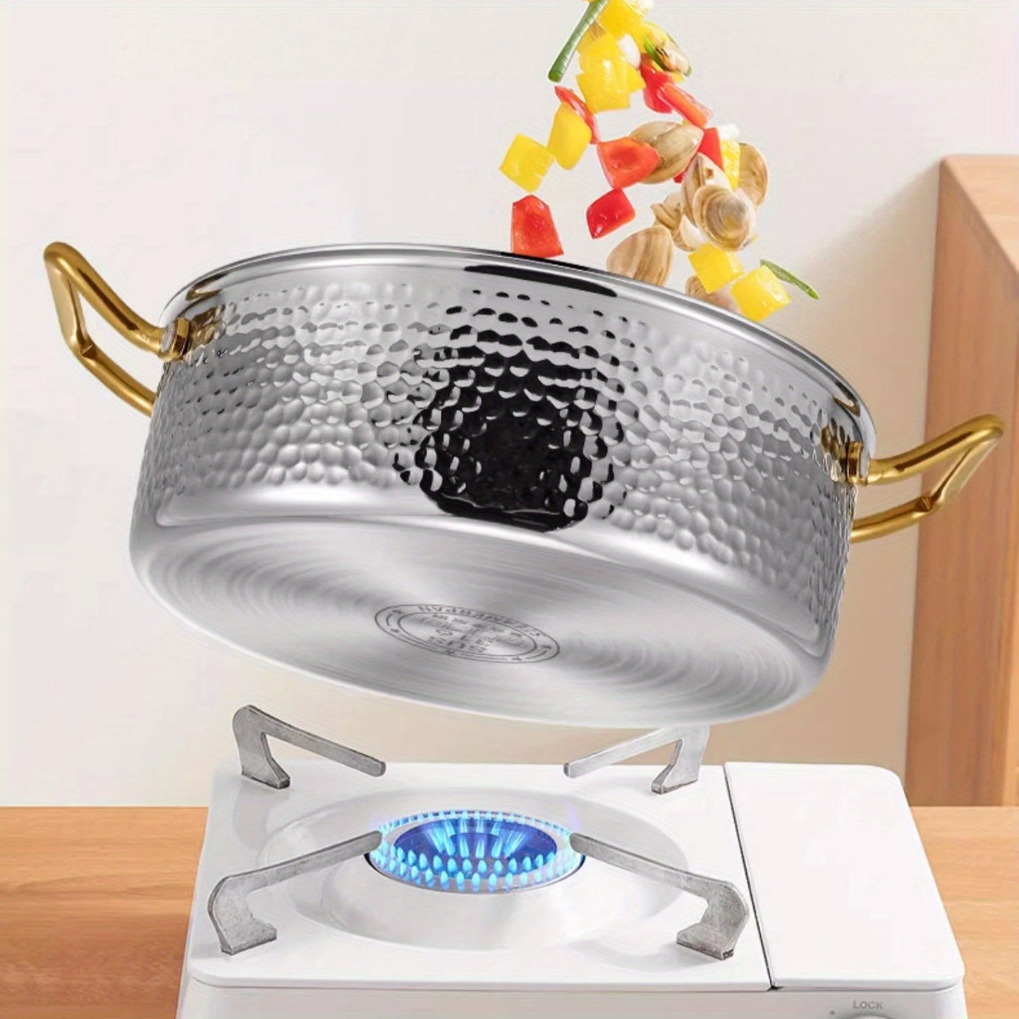 Durable Stainless Steel Hammered Pot, made from 304 SUS with a generous capacity. Ideal for restaurant use, this Chinese soup pot is compatible with both electric and gas stoves. Easy to clean, this kitchen cookware is dishwasher safe.