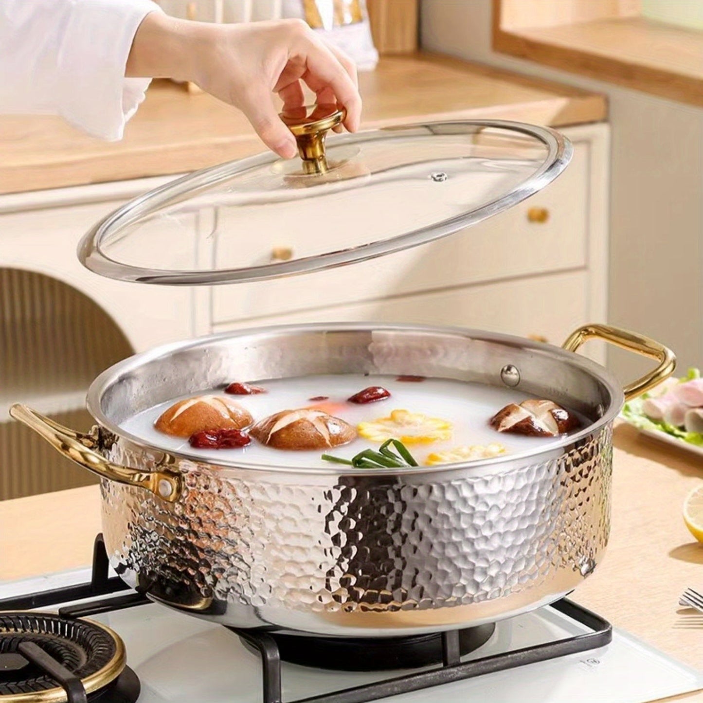 Durable Stainless Steel Hammered Pot, made from 304 SUS with a generous capacity. Ideal for restaurant use, this Chinese soup pot is compatible with both electric and gas stoves. Easy to clean, this kitchen cookware is dishwasher safe.