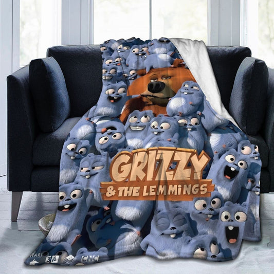 Flannel throw blanket featuring Grizzly & Lemmings anime print made of 100% polyester. This all-season blanket is soft, comfortable, and lightweight, suitable for use on the sofa, office, bed, or during travel. Perfect for gifting, it showcases a