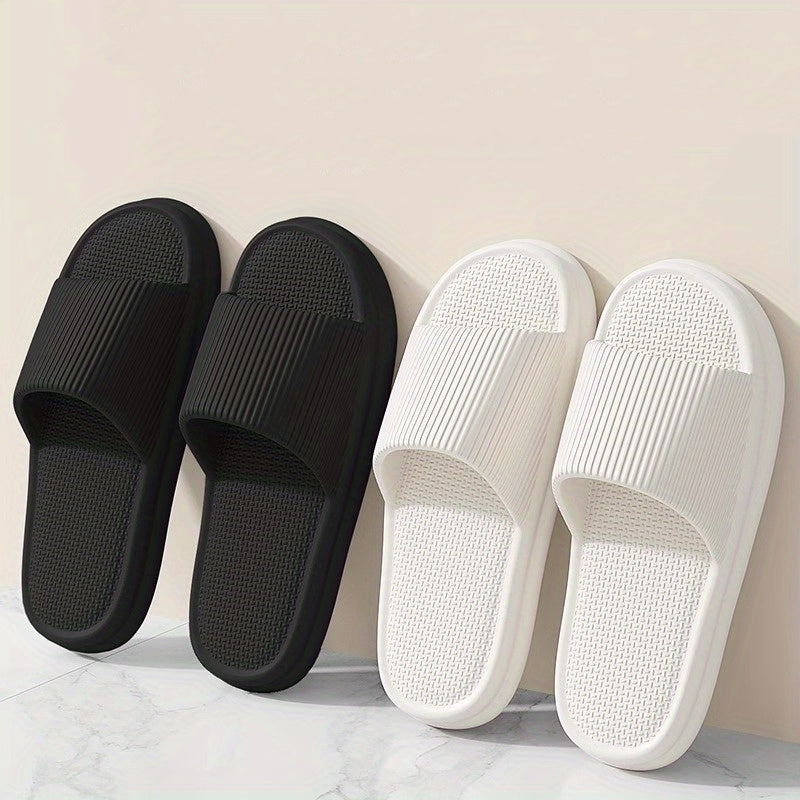 Gender-neutral EVA slippers, solid color, breathable open toe, comfortable, non-slip, durable for indoor wear.