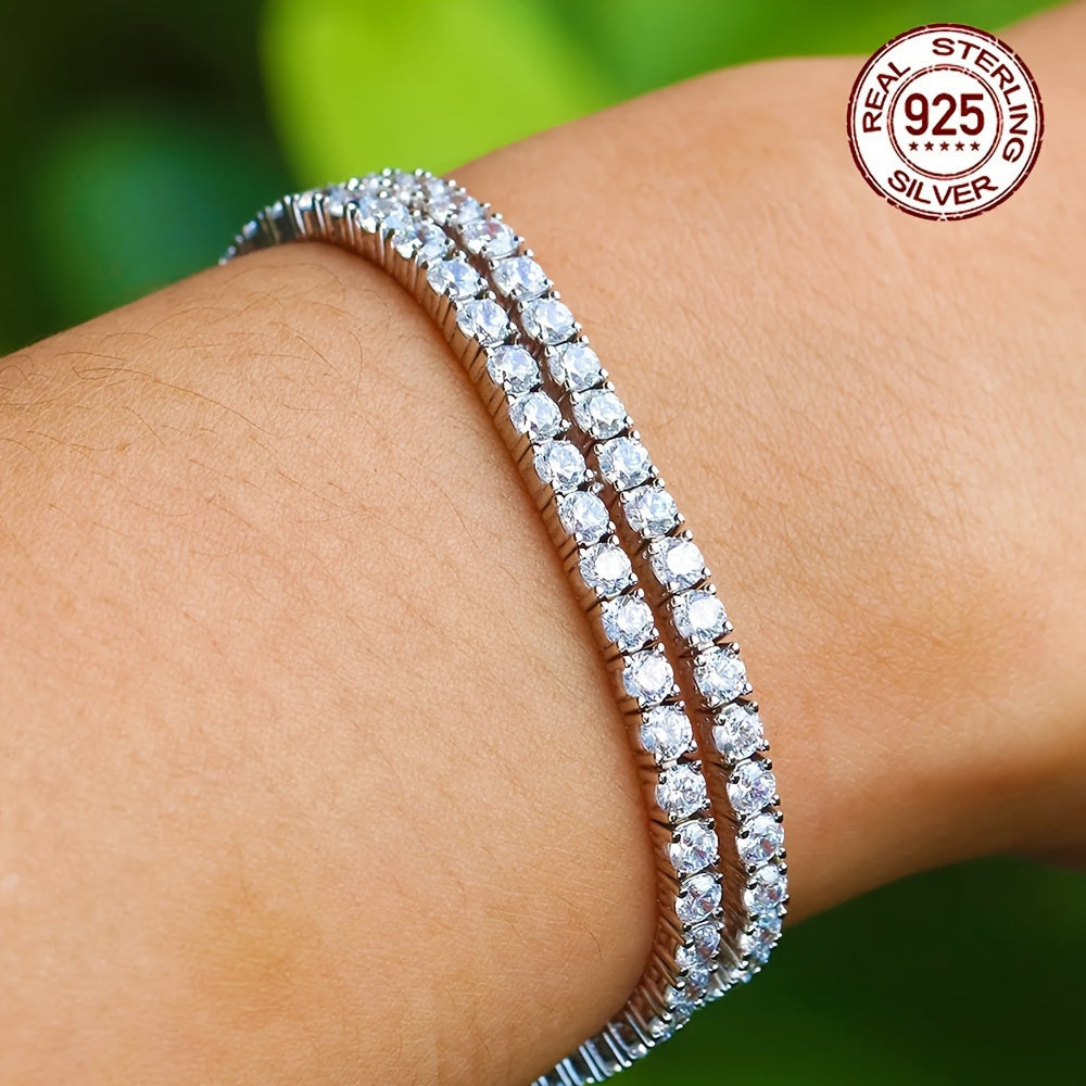 An exquisite 5-carat Moissanite tennis chain bracelet crafted in sterling silver and plated with radiant golden Moissanite. This luxurious piece weighs 0.32 ounces and consists of 50 stunning pieces, each measuring 3 millimeters. A sophisticated and