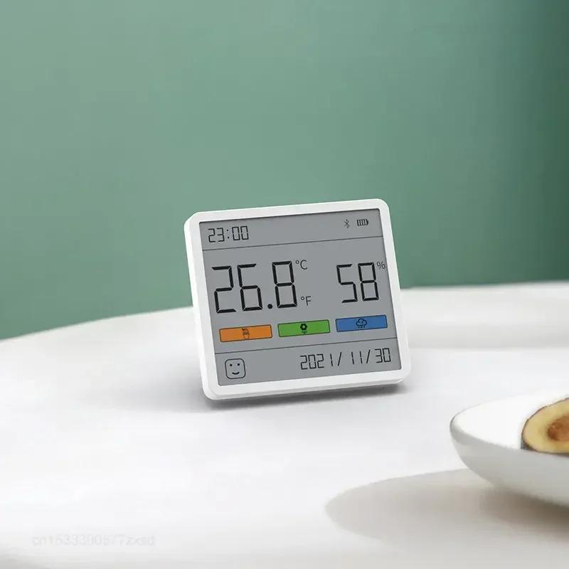 Single piece digital indoor thermometer hygrometer with LCD electronic weather station, clock, and battery-operated (button cell) with a maximum voltage of 3.6V.