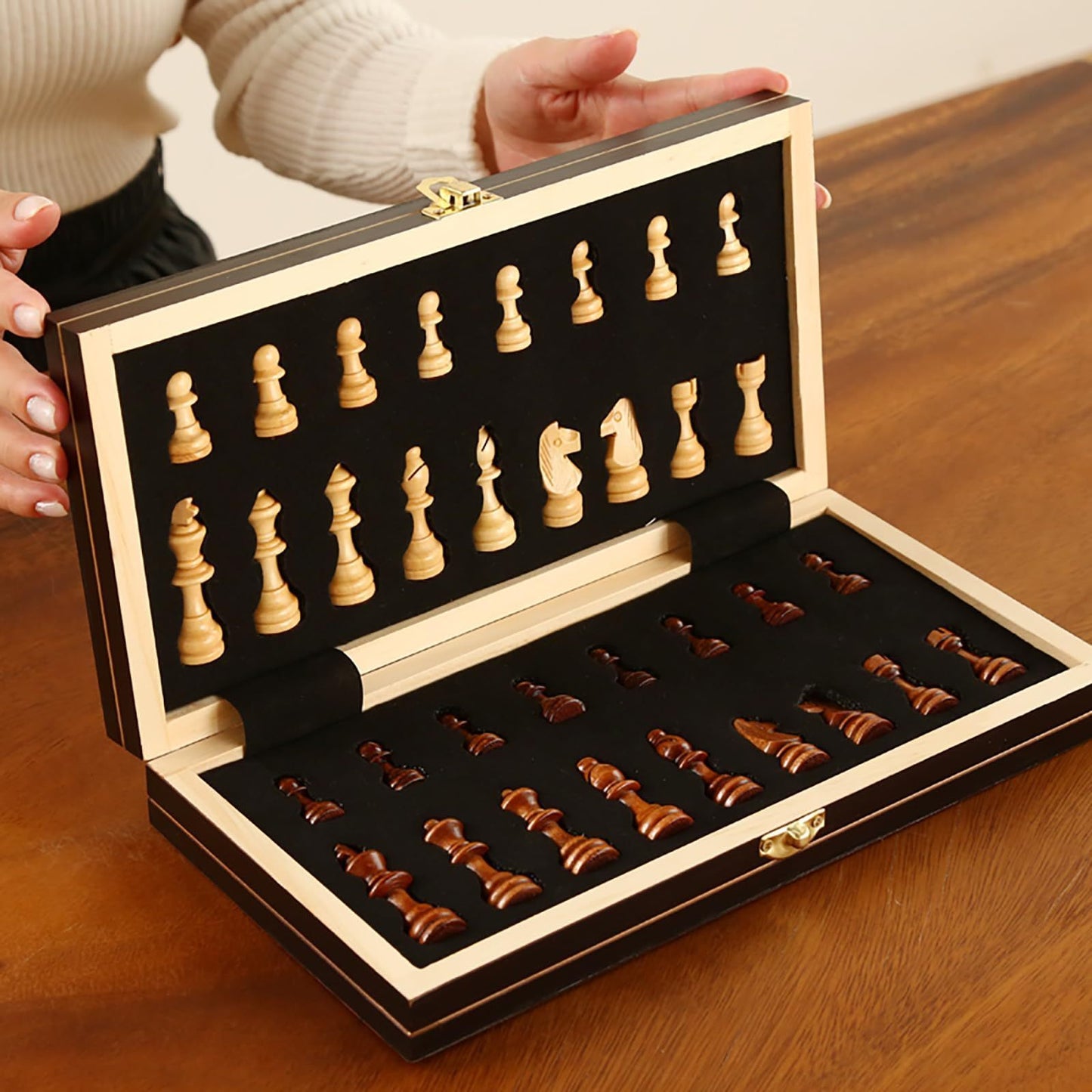 15-inch wooden chess set with folding design, large playing area, and durable construction. Perfect for adults and beginners.Features dark brown and natural wood pieces. Classic strategic