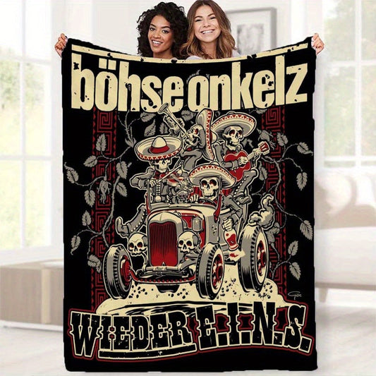 Stay cozy and stylish with the Bohse Onkelz Dia de los Muertos Skull Print Throw Blanket. This warm and comfortable blanket is perfect for all seasons and makes a great addition to your home decor. It can also be used as a multifunctional office and sofa