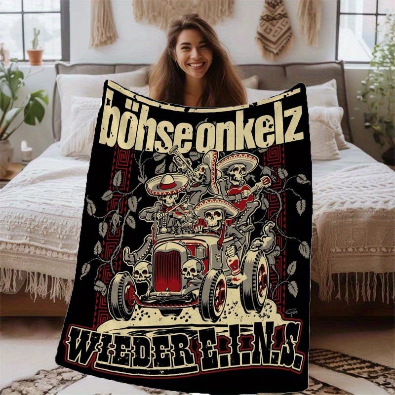 Stay cozy and stylish with the Bohse Onkelz Dia de los Muertos Skull Print Throw Blanket. This warm and comfortable blanket is perfect for all seasons and makes a great addition to your home decor. It can also be used as a multifunctional office and sofa