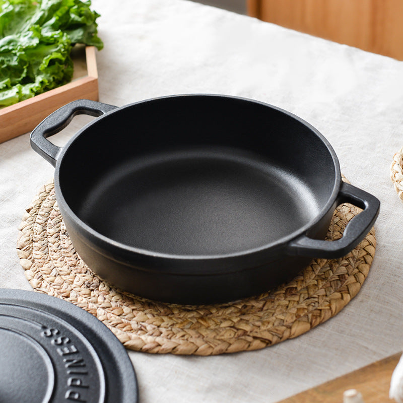 23cm round cast iron enamel pot that is perfect for a variety of uses including stewing, cooking seafood, and baking in the oven. This versatile and durable kitchen cookware is heat resistant, scratch-resistant, and easy to clean.