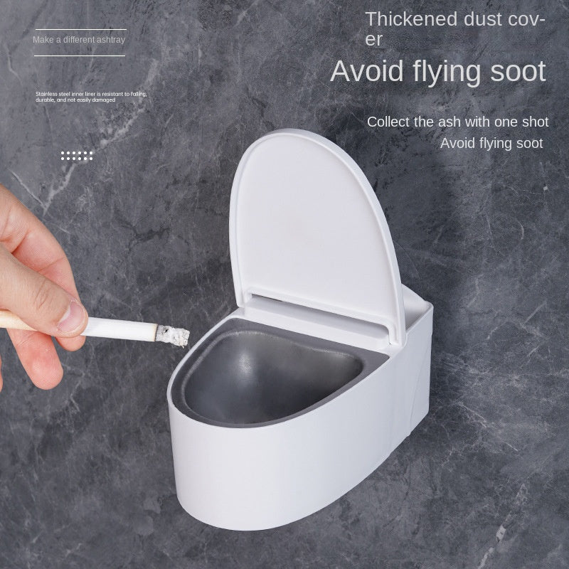 Wall-Mounted toilet ashtray with lid, plastic material, easy to clean, prevents flying ashes, ideal bathroom accessory for home.