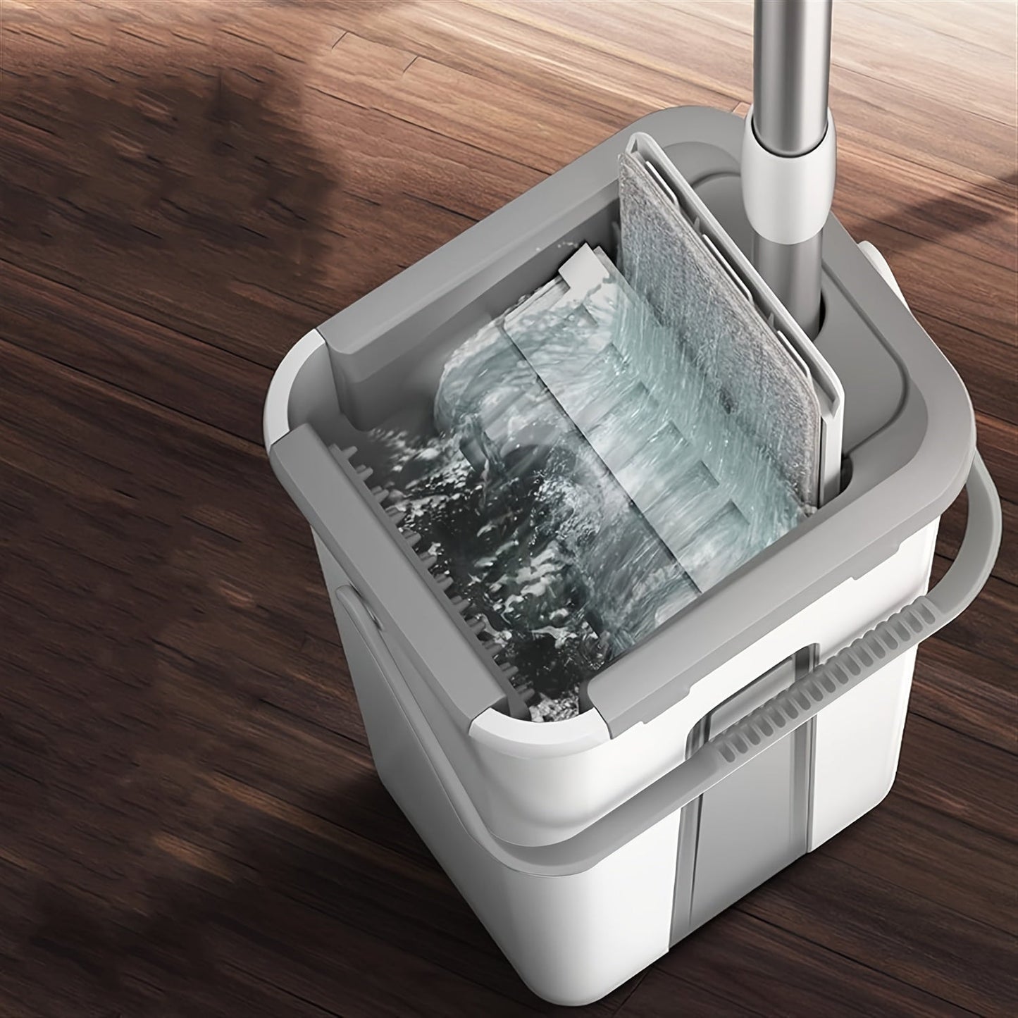 The perfect home cleaning tool for any surface - the Versatile Flat Mop and Bucket Set comes with 2/4 reusable pads for easy wringing and drying. Ideal for kitchen, bathroom, tile, and hardwood floors.