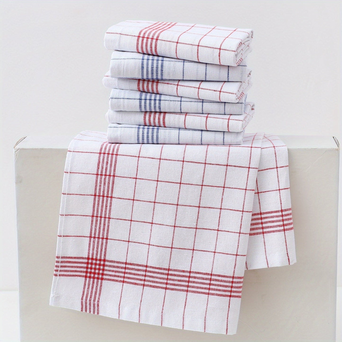 Pack of 12 kitchen towels in 2 colors (blue and red plaid), made of cotton knit with stripes and checkers. These multipurpose cloths are suitable for use in the home, living room, bedroom, outdoor, bathroom, and kitchen. They are reusable cleaning cloths