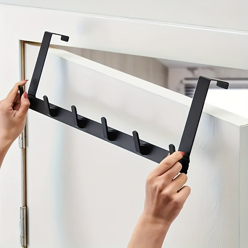 Fashionable over-the-door hook rack with 5 hooks for hanging coats, hats, towels; can be mounted on walls without drilling; versatile organizer for various rooms; made of durable material.