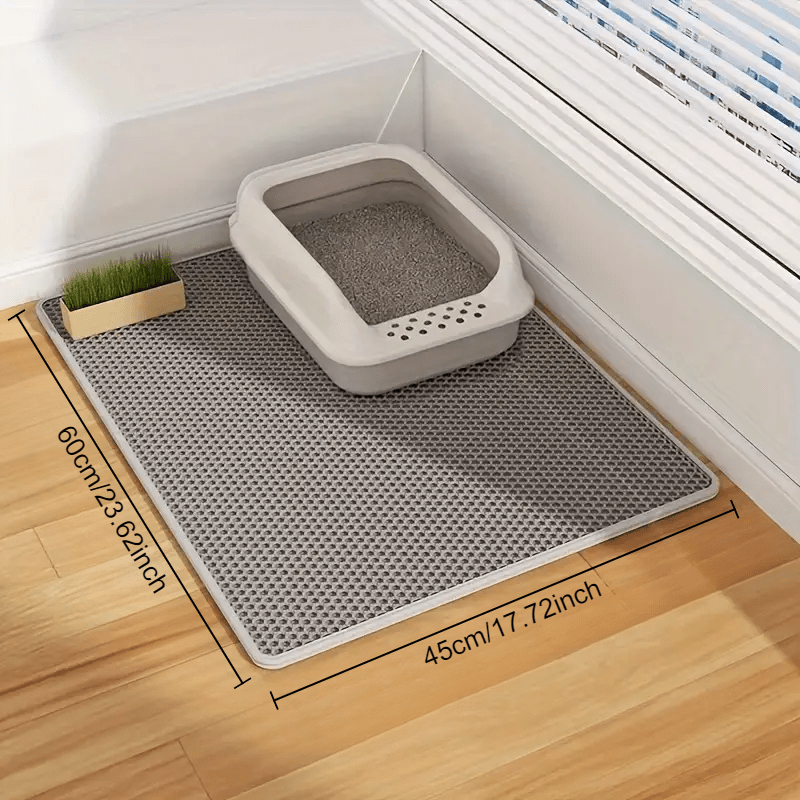 Large, double-layer cat litter mat with splash-proof EVA material, honeycomb design, and non-slip washable pad for pet toilets.