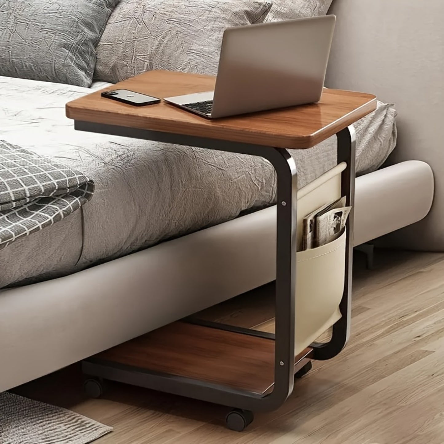 Rolling side table with wheels made of hardwood and metal frame, available in four colors for use in living room or bedside.