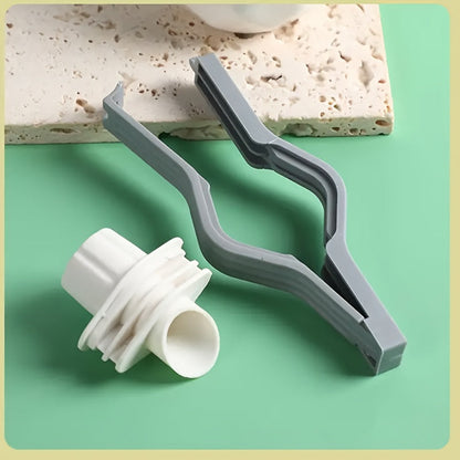 Set of 3 plastic clips with pour spouts for sealing bags, perfect for non-food items. Keep your snacks fresh and dry with these convenient twist cap dispensers. Great for organizing your kitchen storage with cereal and coffee pouches.