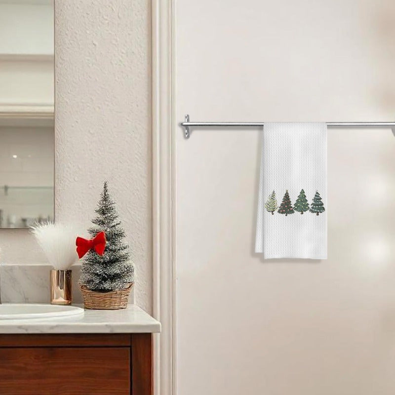 One festive Christmas-themed kitchen towel with green Christmas trees, perfect for use in both the bathroom and kitchen. Ideal for drying dishes or hands, and also great as a decorative touch during the holiday season. Each towel measures 18 by 66.04 cm.