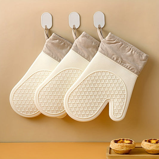 One pair of thick, heat-resistant silicone rubber gloves with anti-slip grip for safe handling in the kitchen oven. Perfect for baking and other hot tasks.