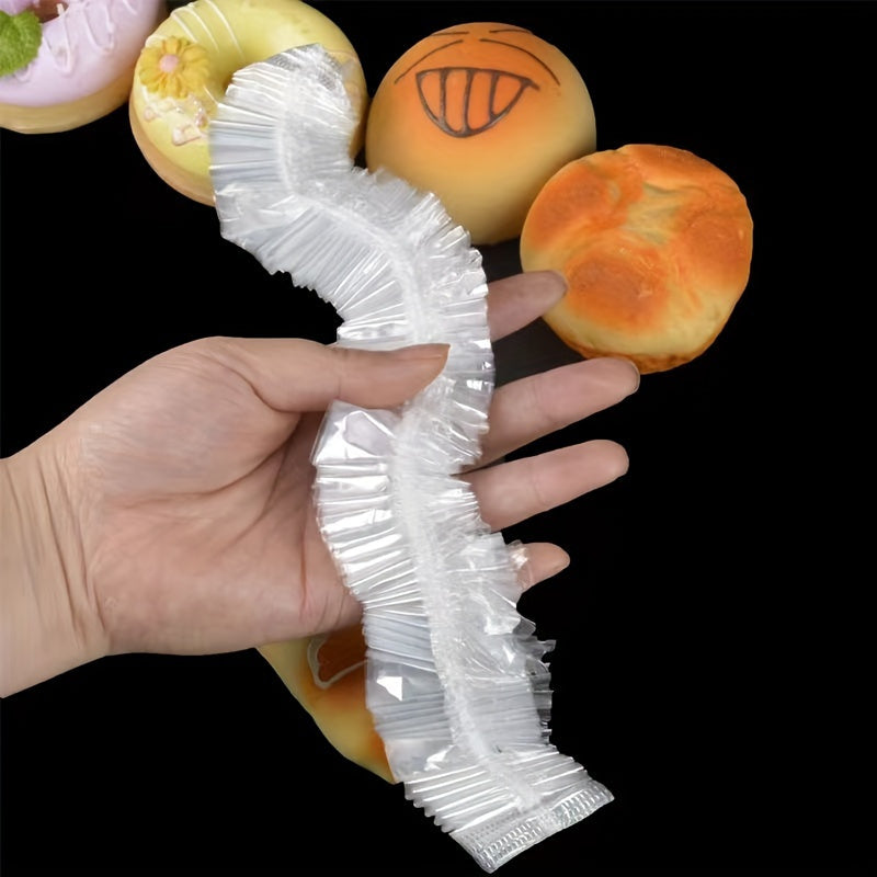 Transparent telescopic food covers that are reusable, elastic, and come in a pack of 50 or 150 pieces. Ideal for covering bread, fruits, vegetables, and desserts, these covers are versatile kitchen essentials for storage.