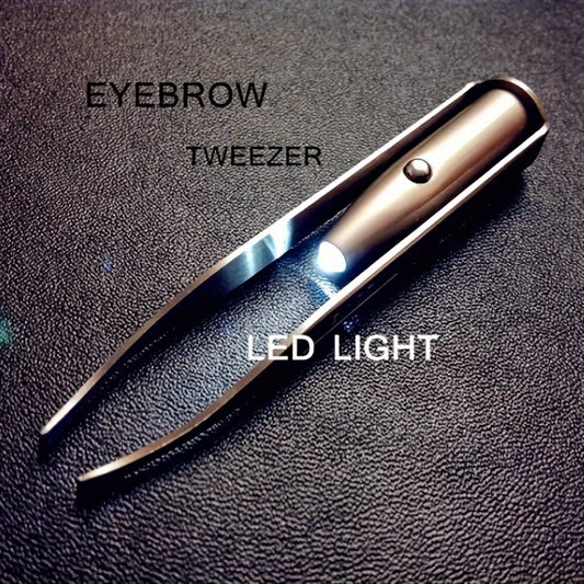 Eyebrow tweezer with LED light for precision beauty. Stainless steel tool removes eyebrows, eyelashes, and hair easily.