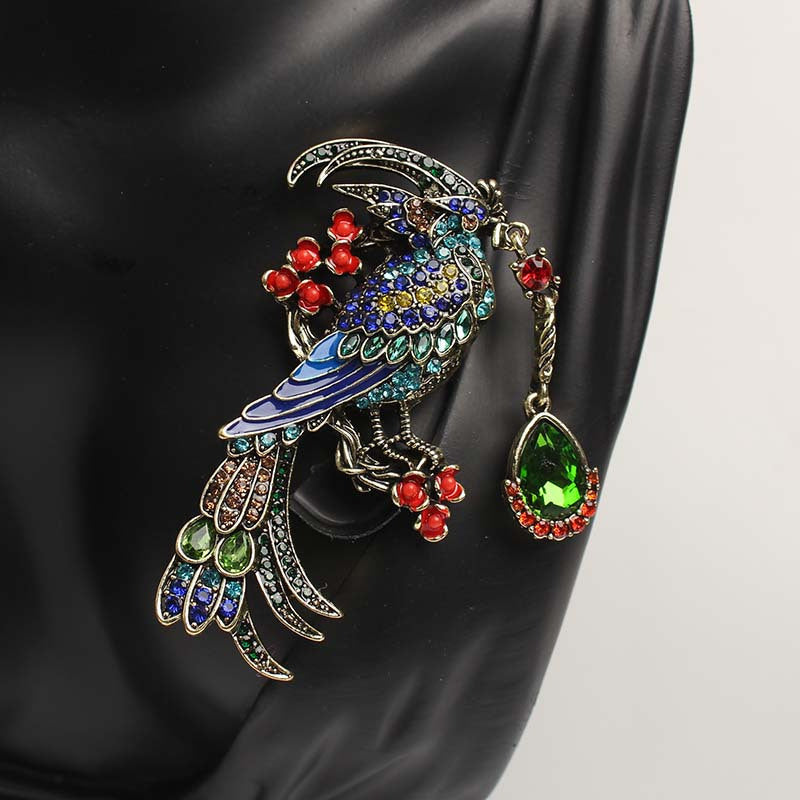 Stylish Enamel and Rhinestone Phoenix Brooch with a Punk Twist - Unique Cartoon-Inspired Design for Women