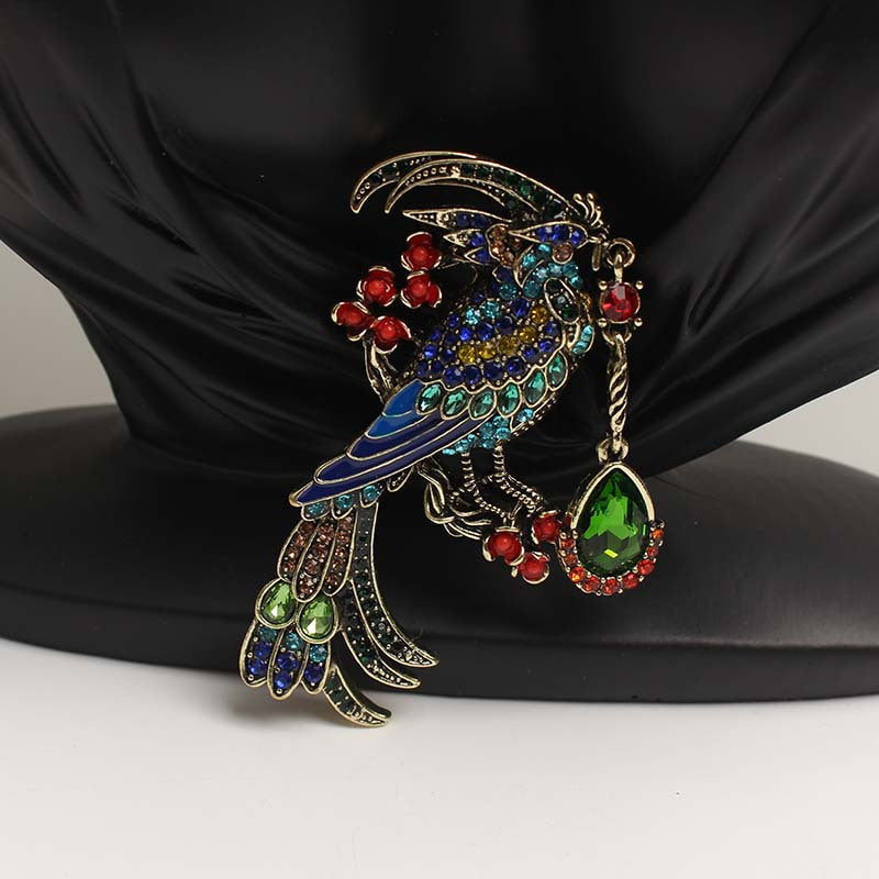 Stylish Enamel and Rhinestone Phoenix Brooch with a Punk Twist - Unique Cartoon-Inspired Design for Women