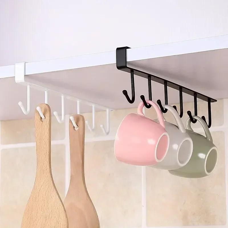 Space-saving kitchen cabinet organizer for coffee cups, belts, and scarves. This durable plastic storage rack features 6 hooks and is perfect for organizing your kitchen.