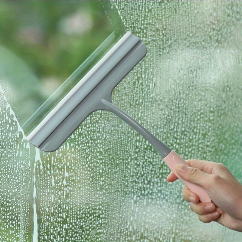 A versatile cleaning set perfect for tackling multiple surfaces, the 2-in-1 Multi-Surface Scrubbing Sponge and Spray Bottle includes a Glass Wiper for easy cleaning of cars, windows, floors, and walls. Ideal for use in the living room, bathroom, or car.