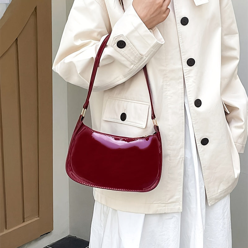 Solid red vintage-style women's handbag from Hong Kong with zipper closure, unlined and lightweight, suitable for casual occasions.