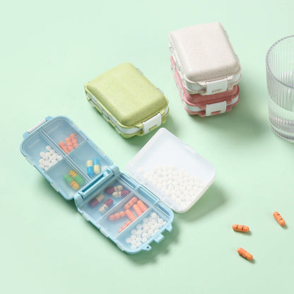 Fashionable sealed small medicine box with three layers, foldable design featuring three sections and 8 compartments, compact mini storage box.