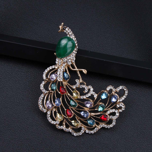 Vintage and Chic Elegant Peacock Brooch Pin adorned with Sparkling Rhinestones - A Stylish Animal Badge for Women, Ideal for Accenting Scarves and Jackets, Enhancing Peacock Decor