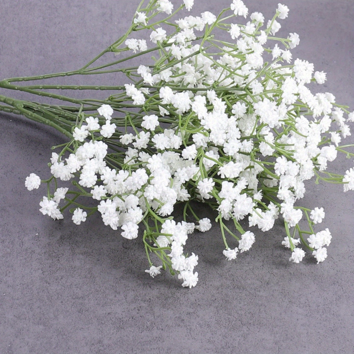 10 elegant white artificial baby's breath flowers with long UV-resistant stems for DIY floral arrangements and home decor, perfect for weddings, parties, and special occasions.