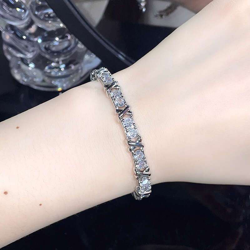 Luxurious and elegant, this Moissanite Twist Cuff Bracelet is crafted from adjustable S925 silver, making it the perfect eternal engagement or wedding bangle for women. This unisex jewelry piece is a beautiful gift for ladies, men, girls, and boys