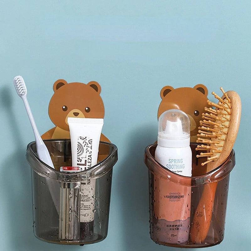 Adorable bear toothbrush cup with toothpaste storage rack and plastic holder, perfect for organizing bathroom essentials in small spaces. Great for home, dorms, and college dormitories.