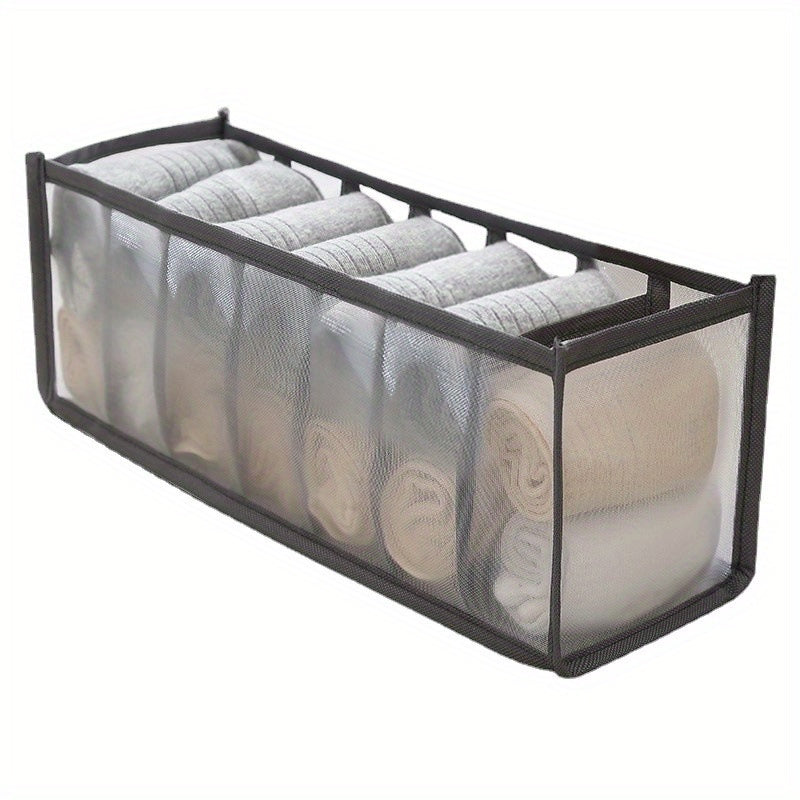 Storage box for home underwear, jeans, socks and other items in a grid format with mesh.