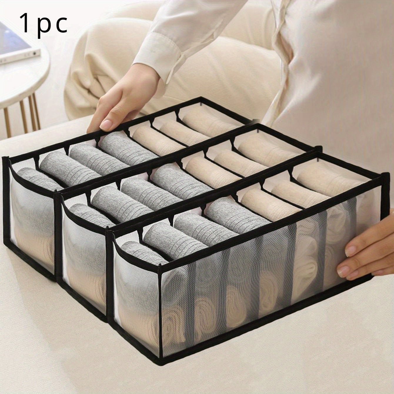 Storage box for home underwear, jeans, socks and other items in a grid format with mesh.