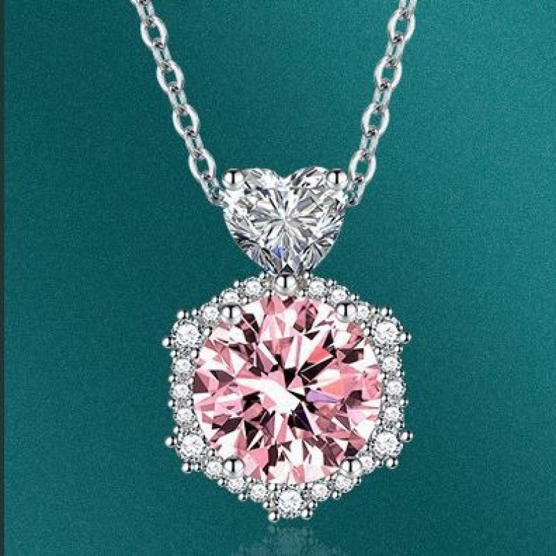 Fashionable necklace featuring a shining moissanite pendant and a pink diamond leaf design