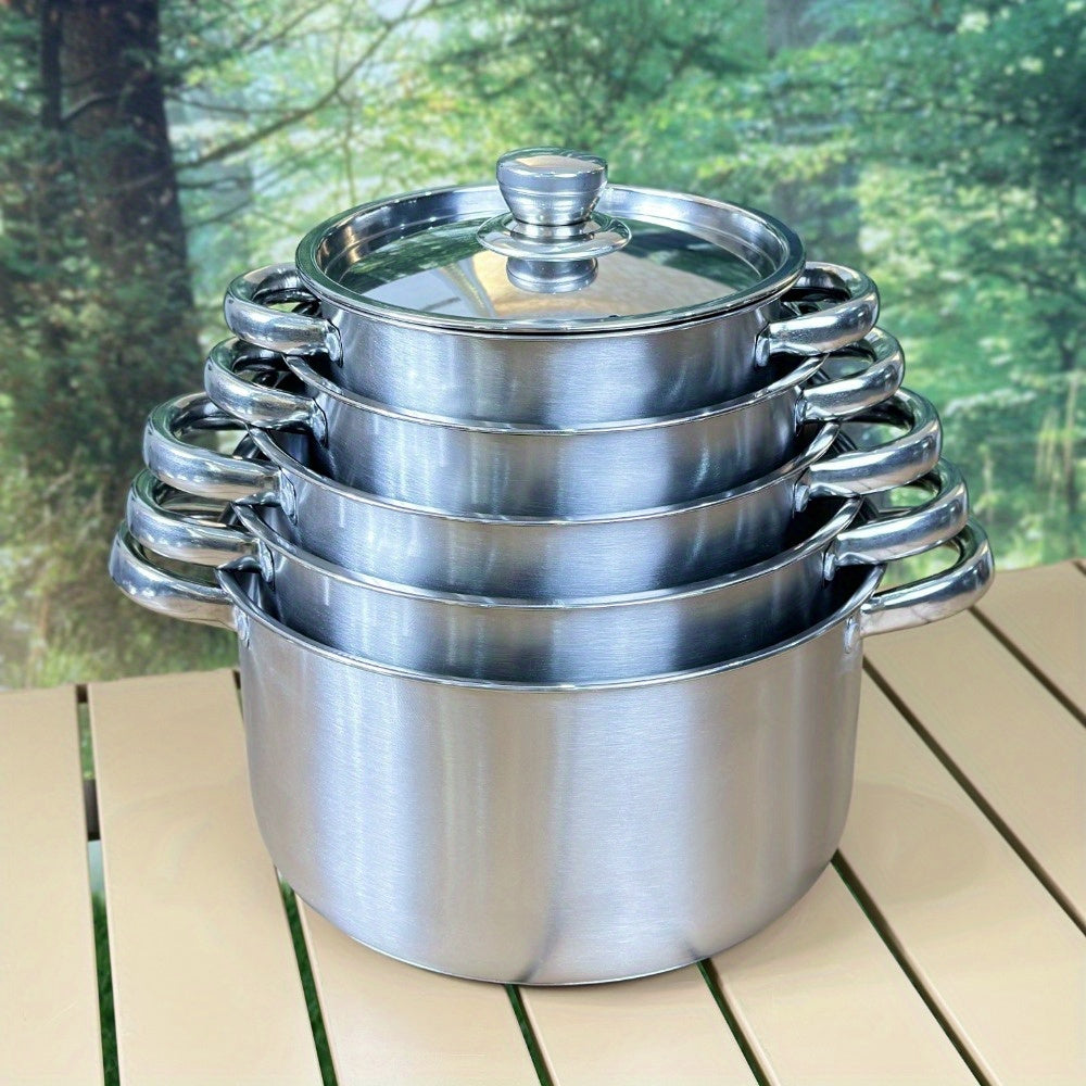 This Stainless Steel Cookware Set includes 10 pieces, featuring 5 pots with lids. The triple-layer bottom ensures even heating, and the dual handles make it perfect for home kitchens.