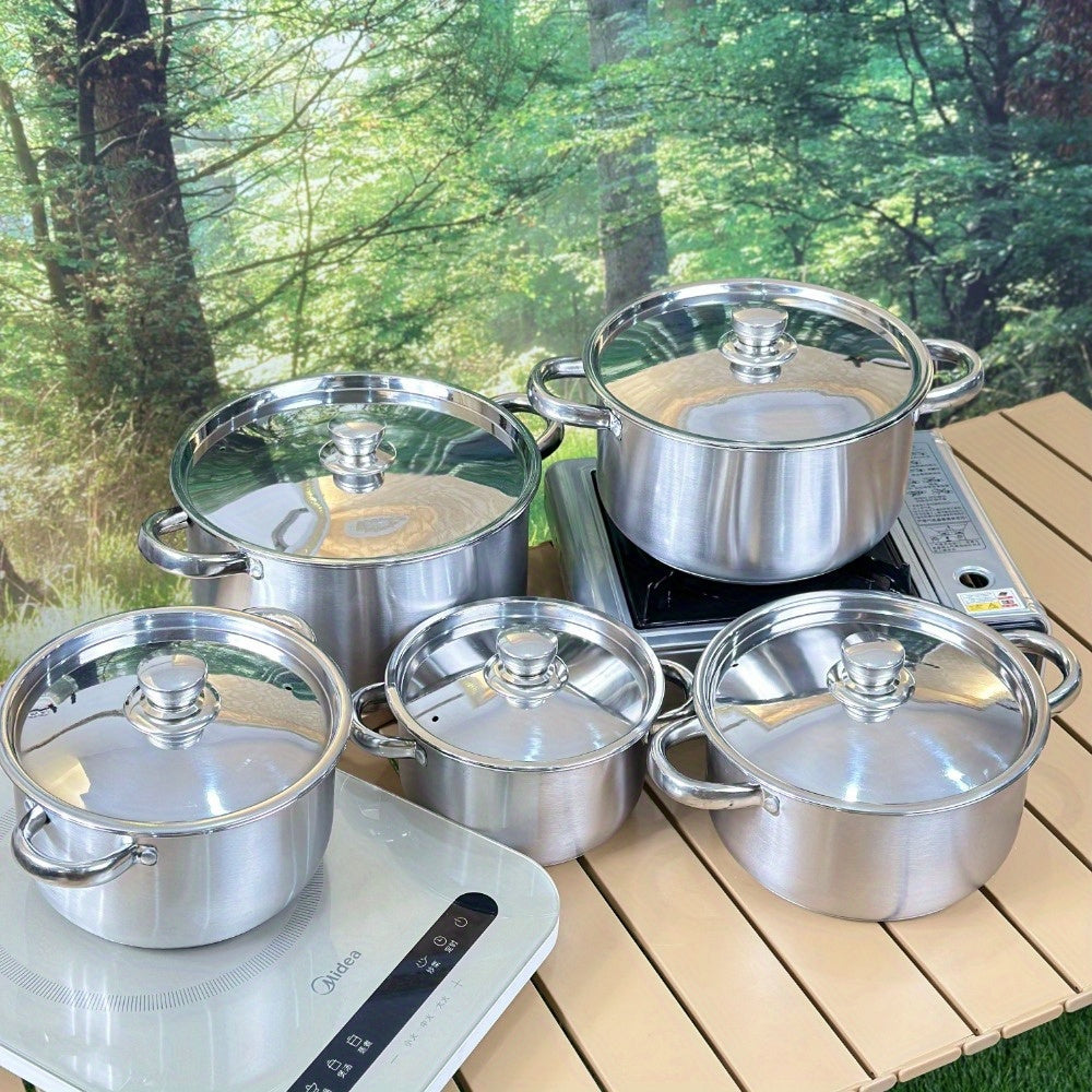 This Stainless Steel Cookware Set includes 10 pieces, featuring 5 pots with lids. The triple-layer bottom ensures even heating, and the dual handles make it perfect for home kitchens.