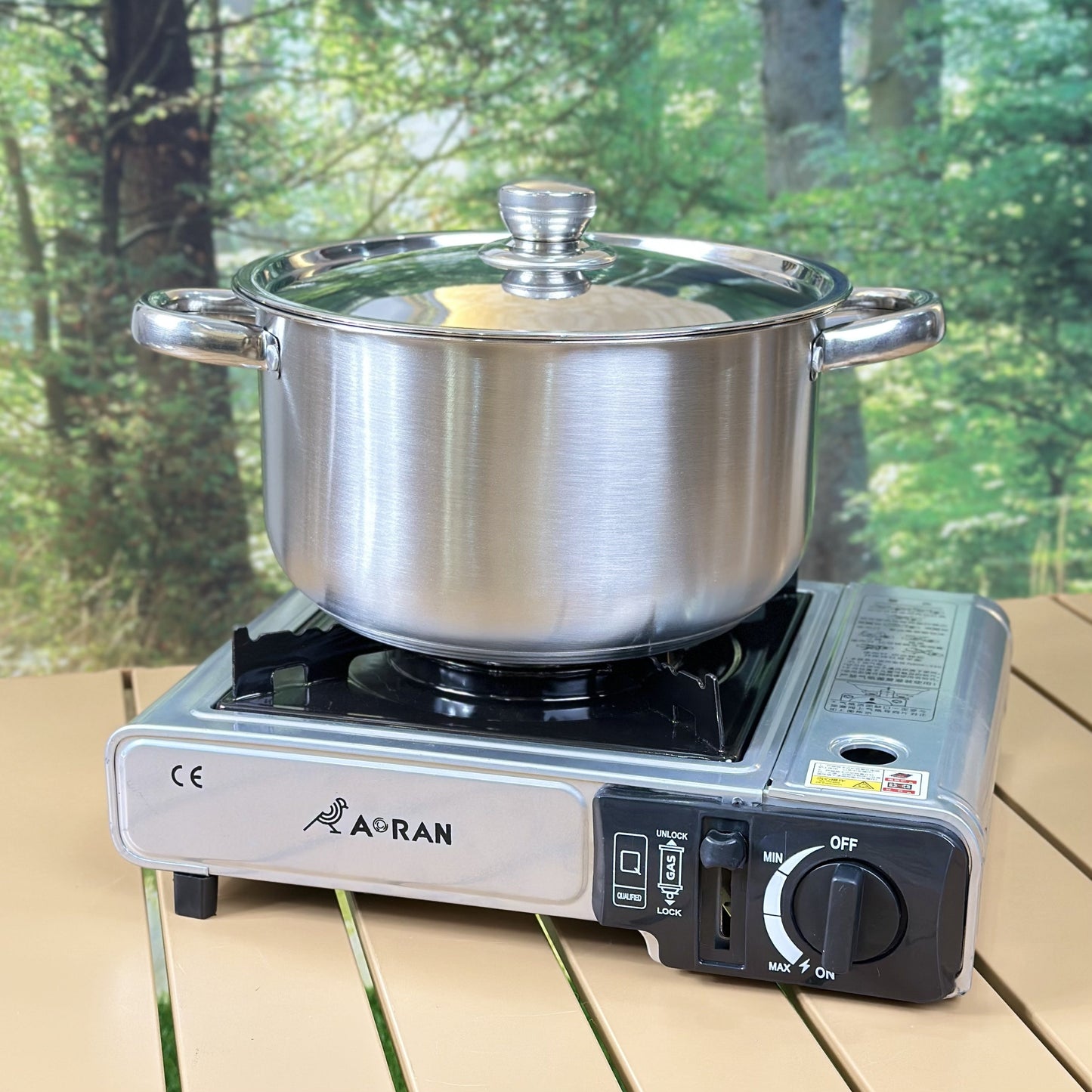 This Stainless Steel Cookware Set includes 10 pieces, featuring 5 pots with lids. The triple-layer bottom ensures even heating, and the dual handles make it perfect for home kitchens.